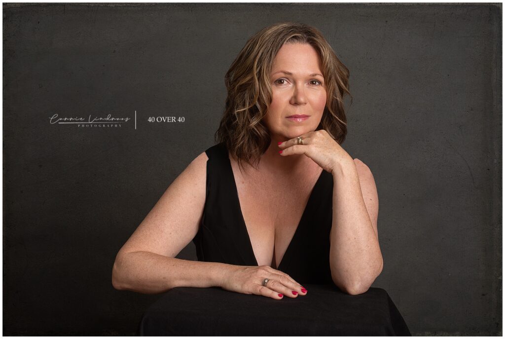 Poised portrait of Alaine resting on her arm. 